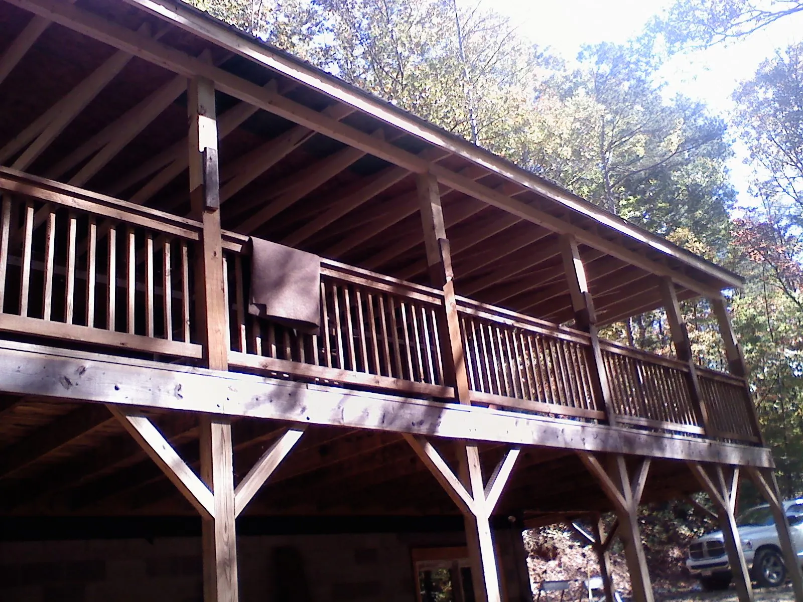 Timber framing under a new elevated porch and deck — Roof Leak Repair in Stovall by Roofing Brothers